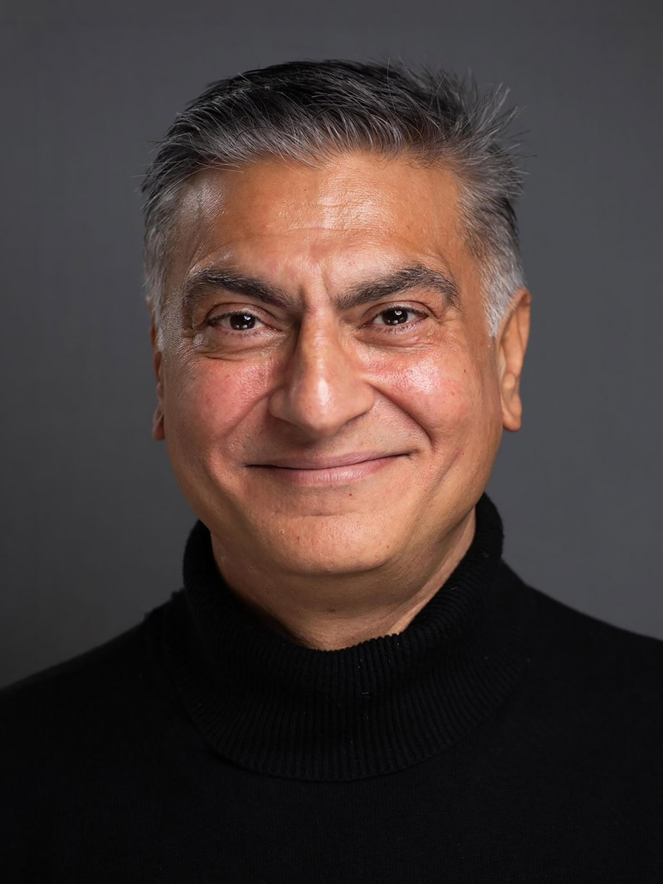 Portrait of Hajaz Akram, who plays Imran Sharma in Open Return