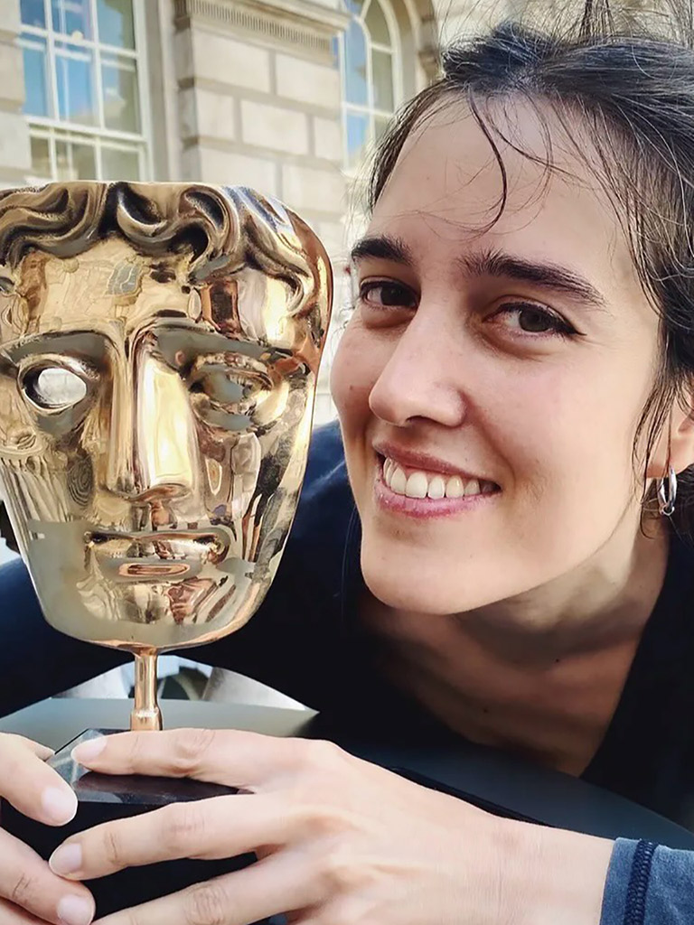 Portrait of Beatriz Delgado, director of photography of Open Return, with a BAFTA award